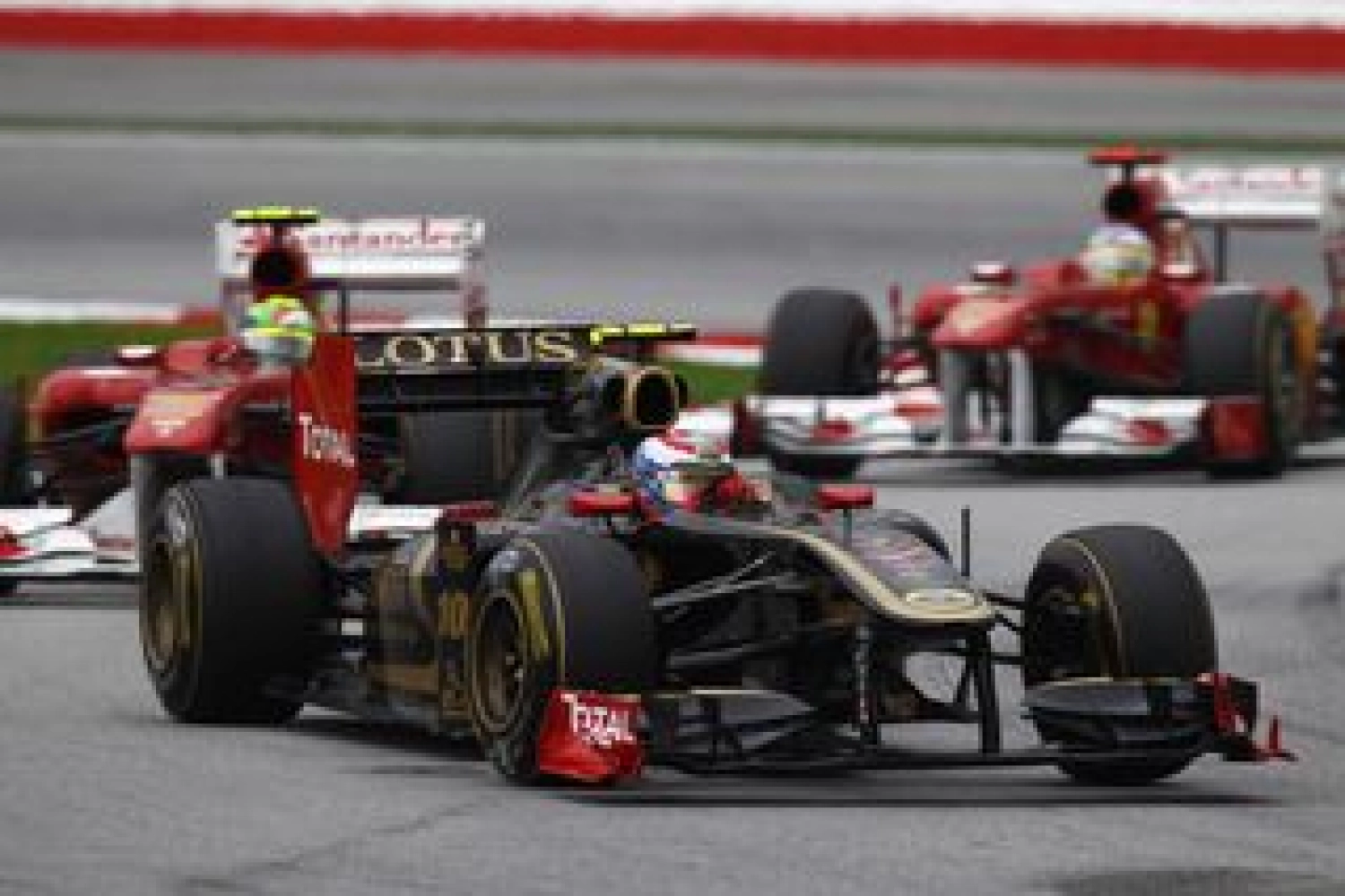 Lotus Renault in pursuit of Ferrari
