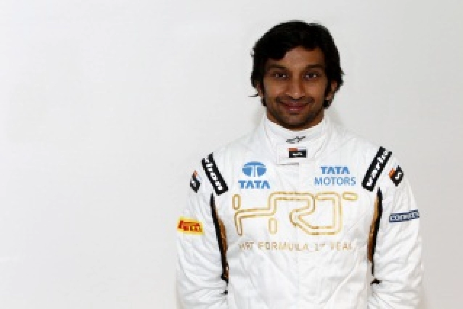 Karthikeyan wants to keep his seat at HRT for 2013