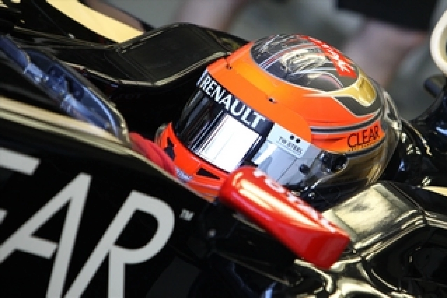 Saturday: Grosjean places his Lotus behind the McLarens
