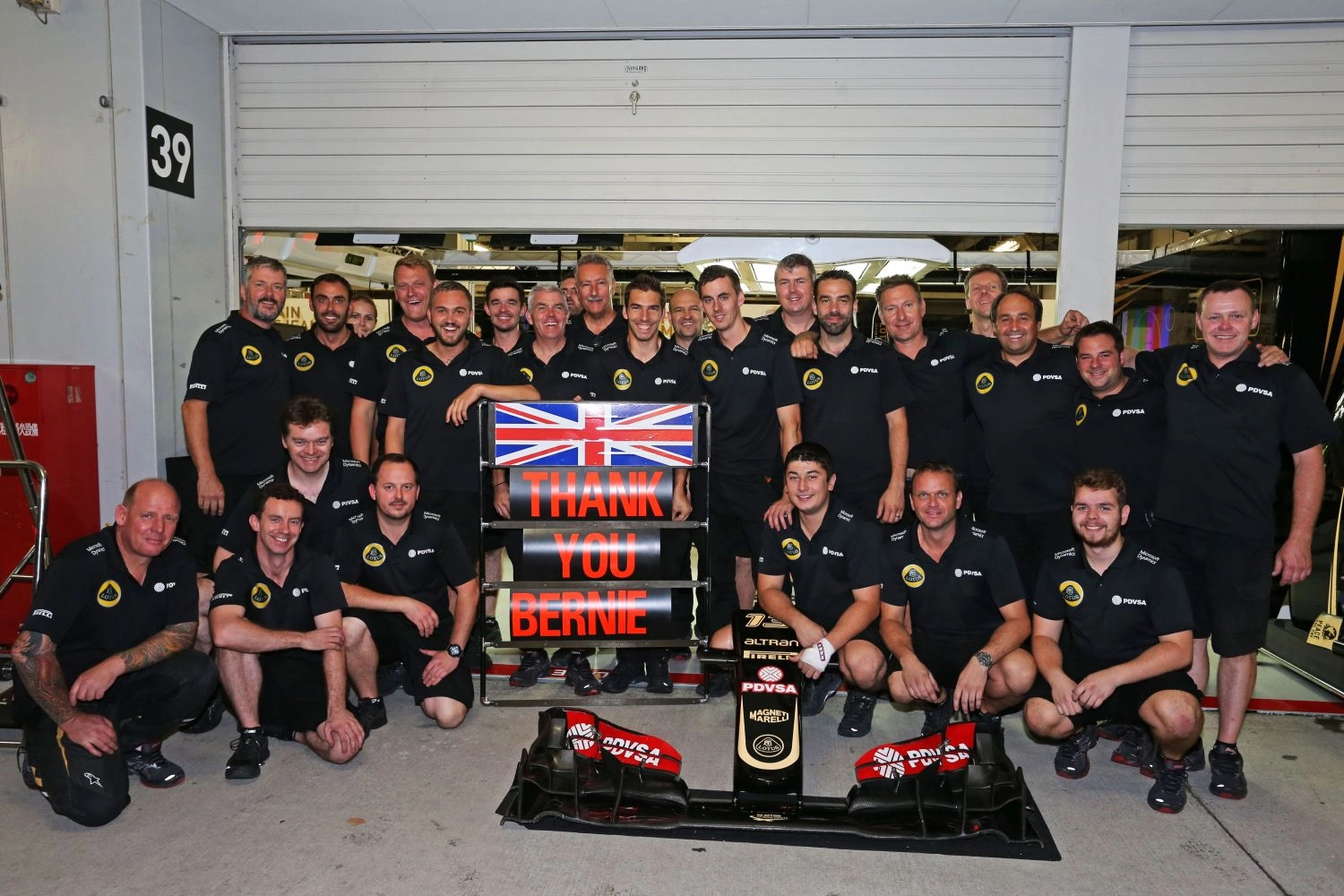 Due to lack of money, Lotus mechanics welcomed into the Paddock Club by Bernie Ecclestone