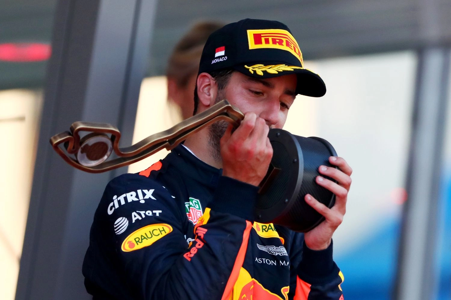 Daniel Ricciardo takes back a small cup in Monaco