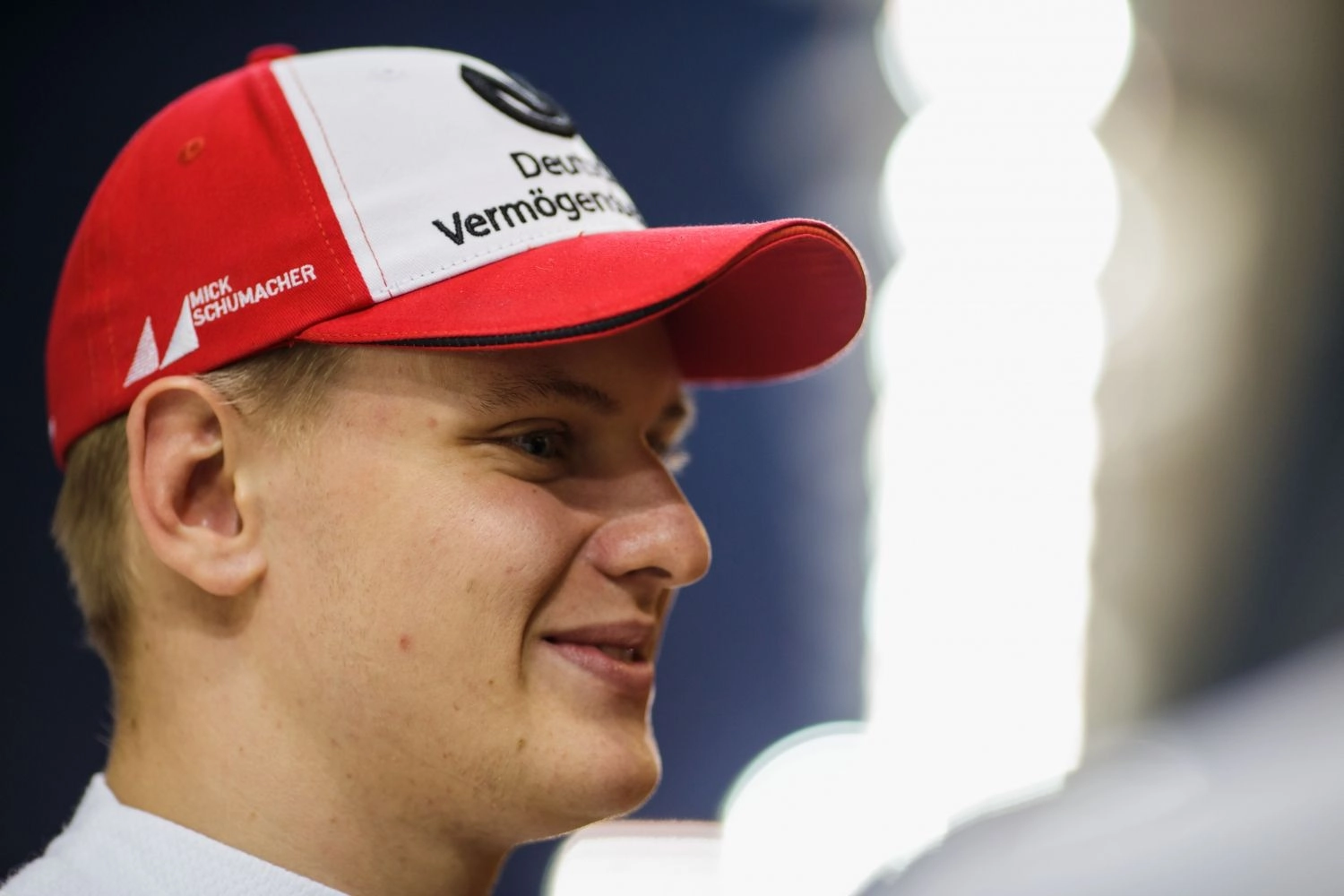 Mick Schumacher behind the wheel of a Ferrari and an Alfa Romeo in Bahrain