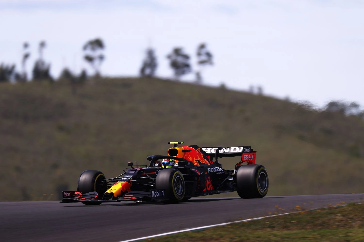 Sergio Perez sanctioned for driving too fast in the pit lane