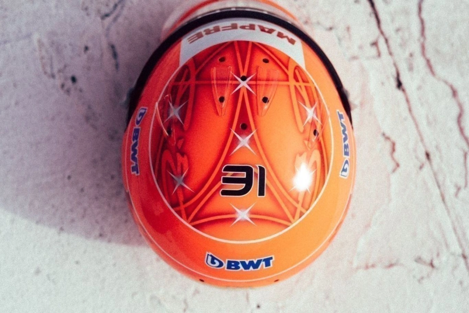 A tribute helmet for Ocon