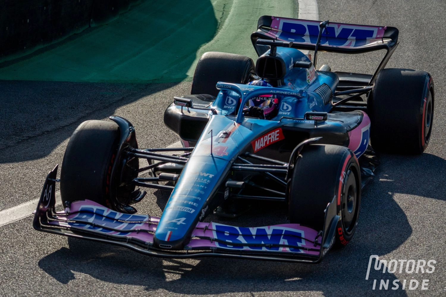 Fernando Alonso penalized after contact with Esteban Ocon