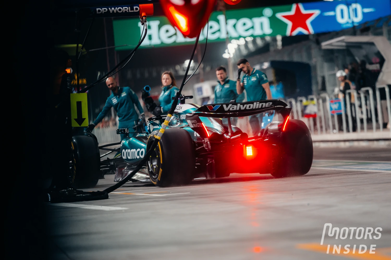 Fernando Alonso speeding in the pit lane