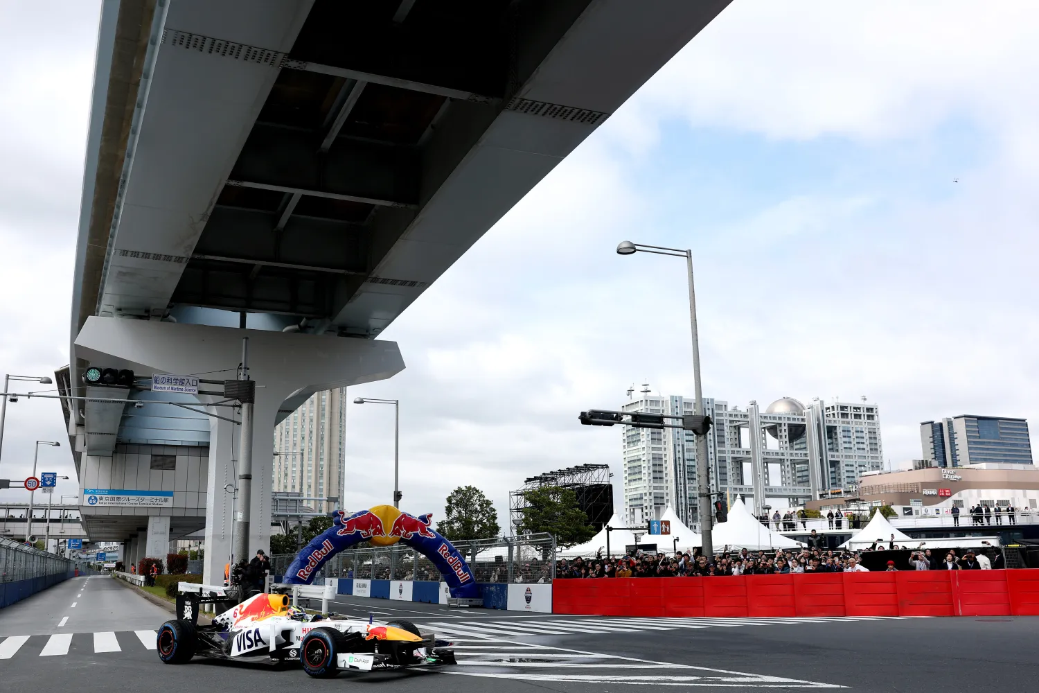 Hadjar breaks his fin during a promotional show on the streets of Tokyo
