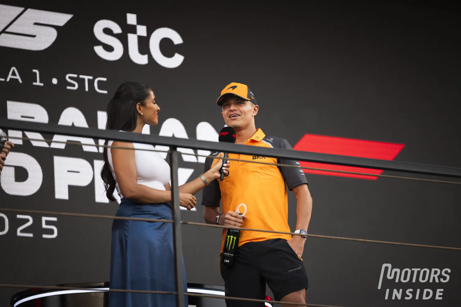 Lando Norris holds off Oscar Piastri to take second place on the podium at Imola