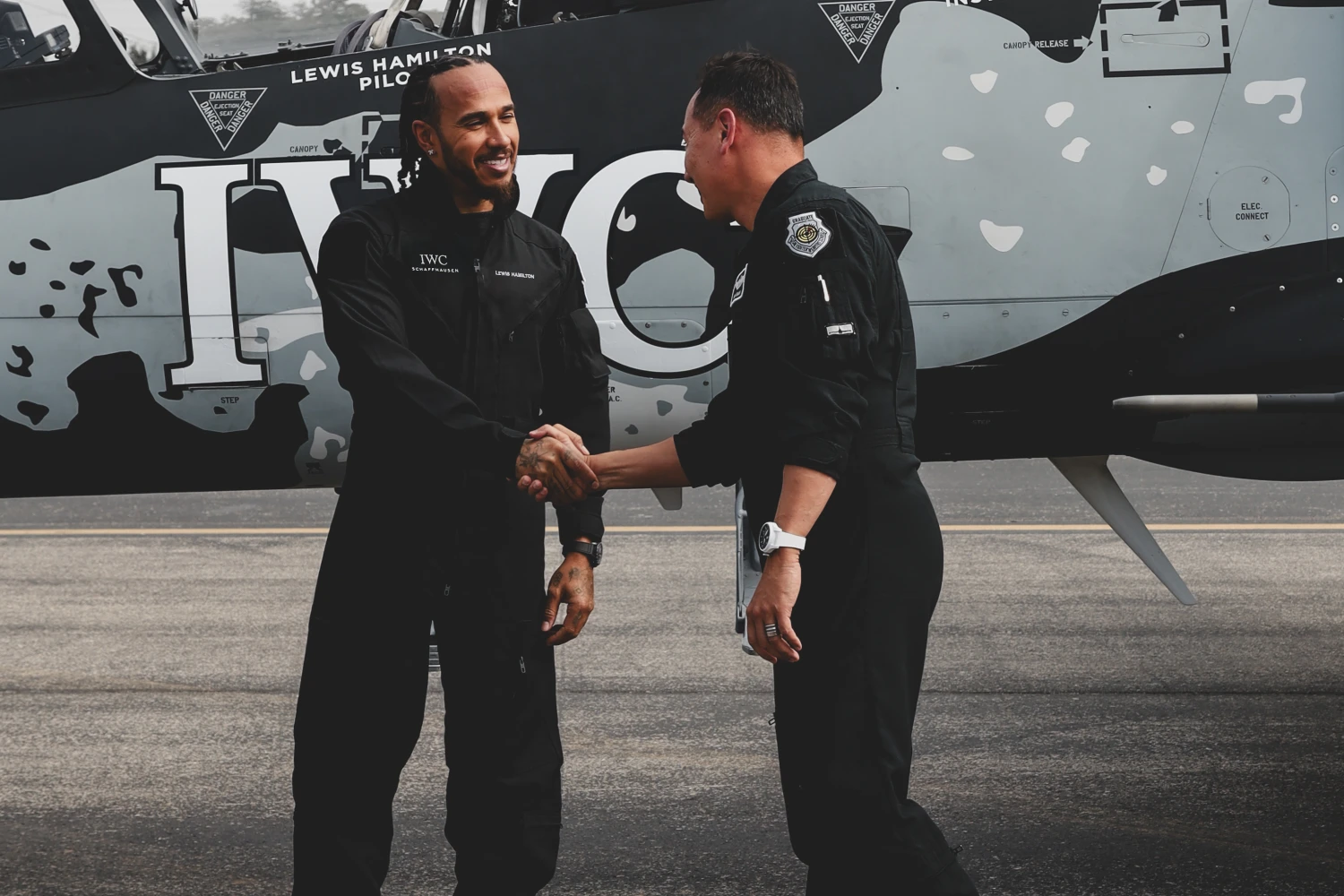 IWC / Hamilton shakes hands with instructor Baum